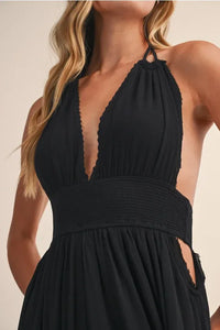 Black crinkle linen maxi dress with deep v neckline smocked waistband and side cutouts in linen maxi dress style