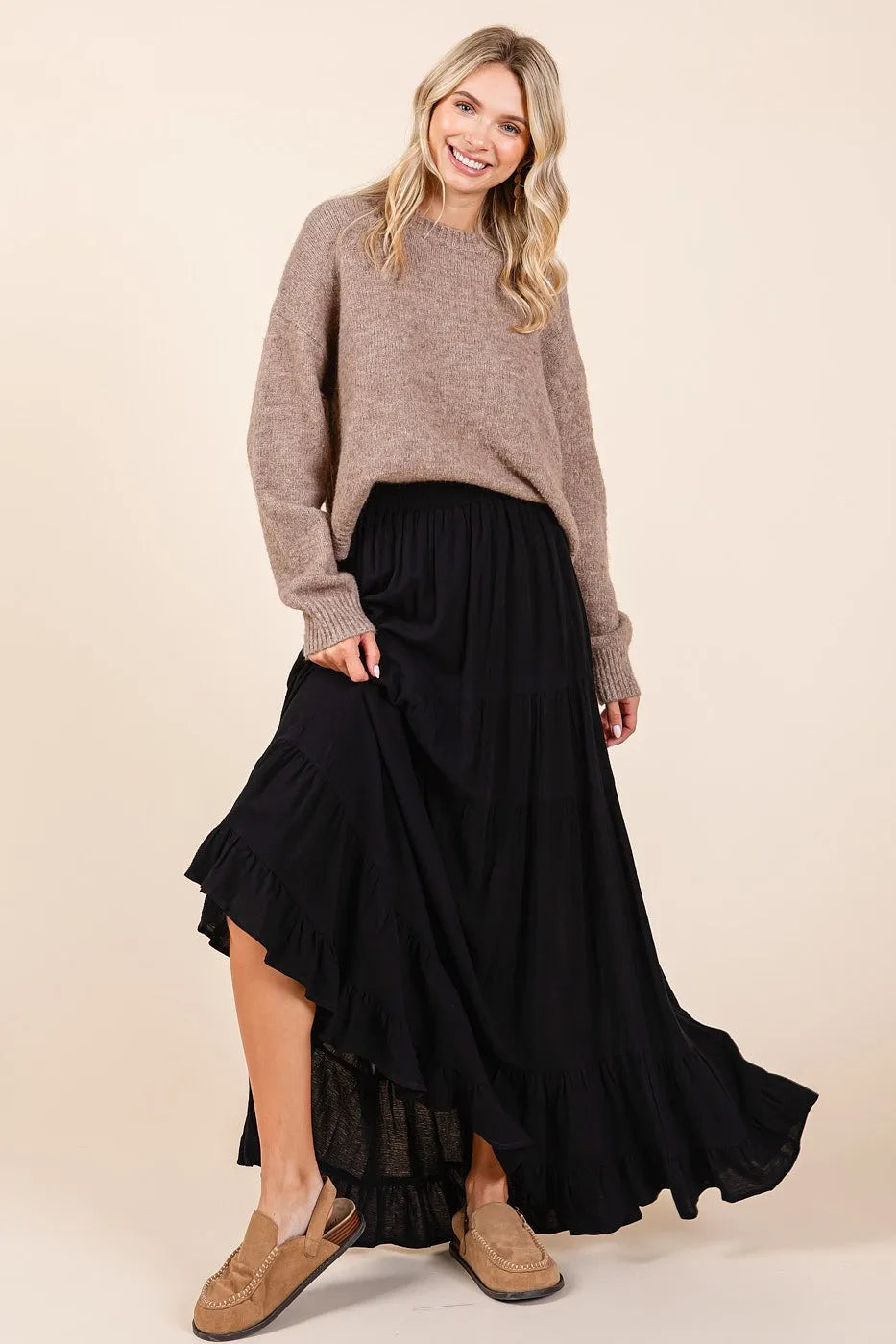 Black tiered flowy elastic waist maxi skirt with high-low ruffle layered hem and sheer mesh overlay