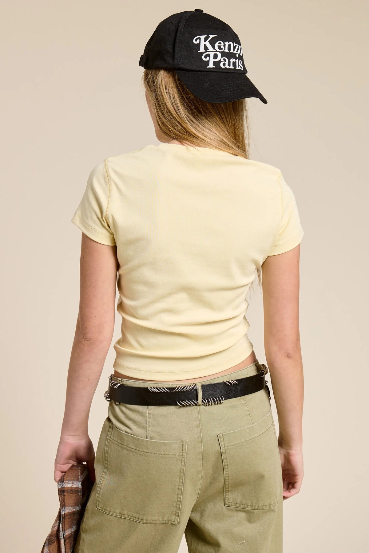 Black Kenzo Paris baseball cap with white embroidered logo paired with fitted crewneck baby tee