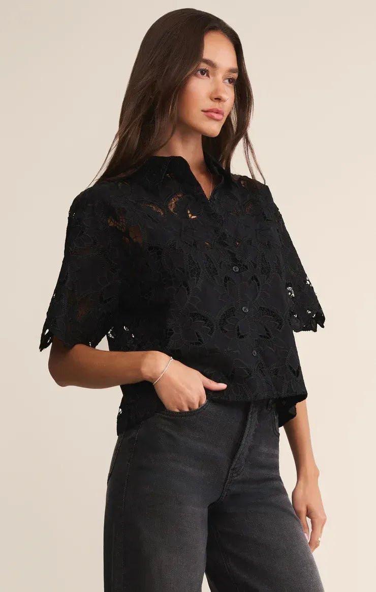 Black lace midnight embroidered short sleeve top with delicate floral patterns and flutter sleeves