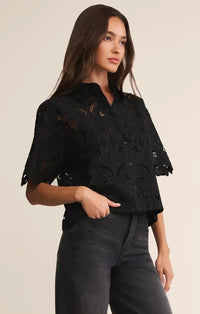 Black lace midnight embroidered short sleeve top with delicate floral patterns and flutter sleeves