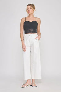 Black floral lace scallop edge sweetheart bralette with thin straps and scalloped hemline crop top design