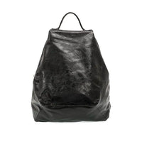 Black leather maggie modern backpack with a slightly wrinkled glossy finish padded pocket and adjustable shoulder straps