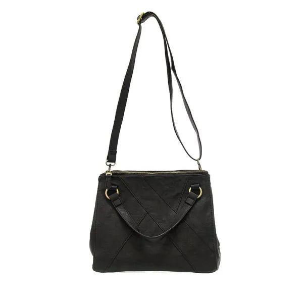 Black leather janet puzzle convertible crossbody tote with quilted diamond stitching and gold-tone hardware