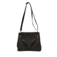 Black leather janet puzzle convertible crossbody tote with quilted diamond stitching and gold-tone hardware