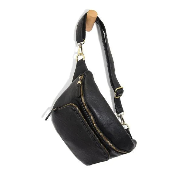 Black leather rory organizer sling belt bag with gold-toned zippers and hardware for stylish hands-free use