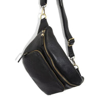 Black leather rory organizer sling belt bag with gold-tone zippers and hardware for stylish organization