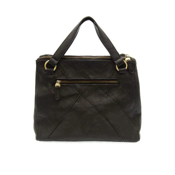 Black leather janet puzzle convertible crossbody tote with gold-tone zippers and handles for versatile use