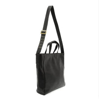 Black leather alma buckle tote bag with gold-tone buckle and adjustable strap for versatile everyday use