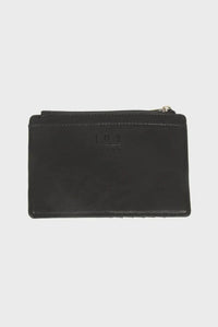 Black leather penny mini travel wallet with zipper and subtle embossed joy branding for secure organization