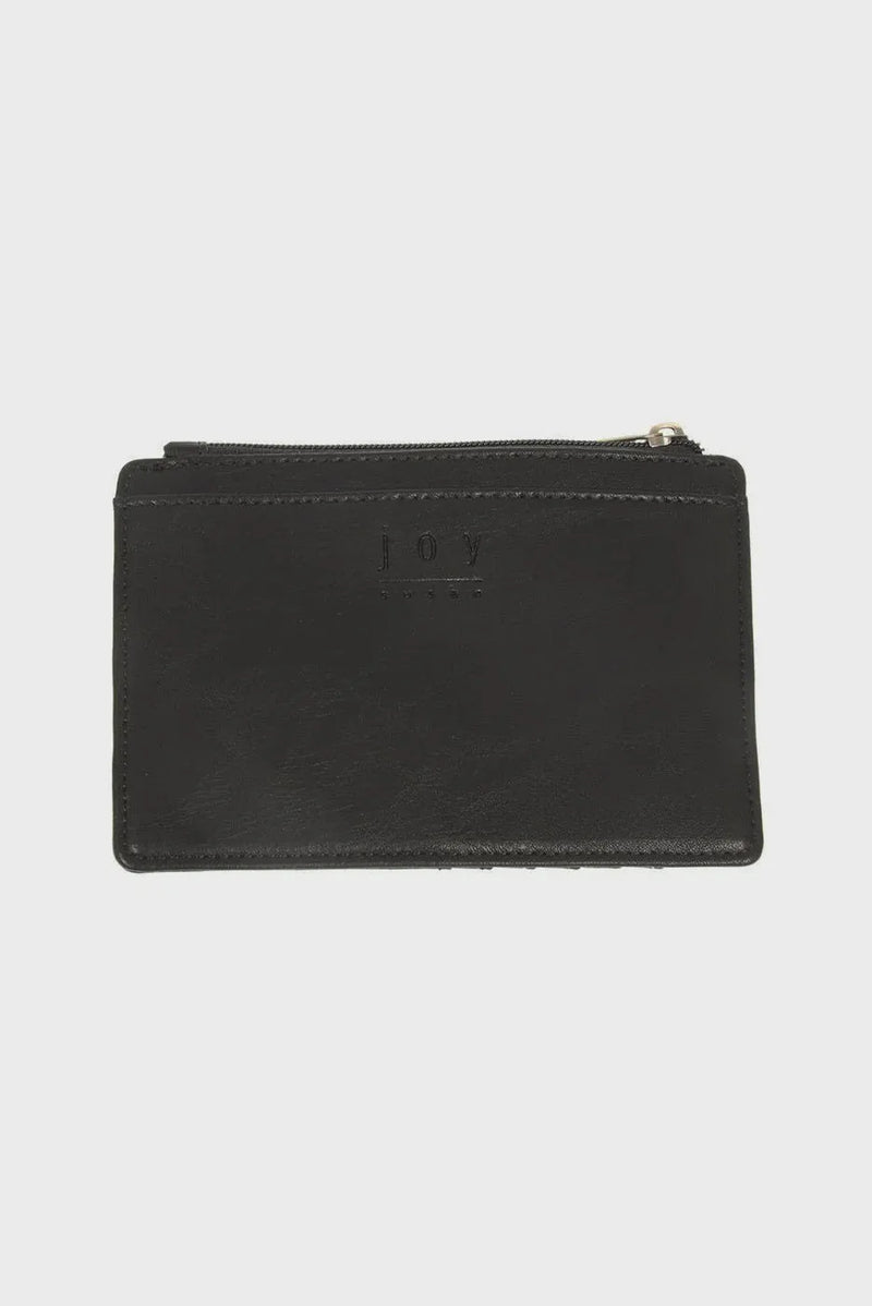 Black leather penny mini travel wallet with zipper and subtle embossed joy branding for secure organization