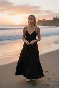 Spaghetti strap tiered maxi dress in flowing black with v-neckline