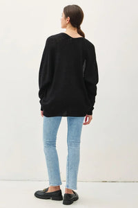 Cropped kimono crochet cardigan in black oversized knit with sheer mesh sleeve panels