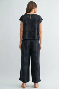 Black paisley printed elastic waist wide-leg pants with relaxed fit and subtle texture for comfortable wear