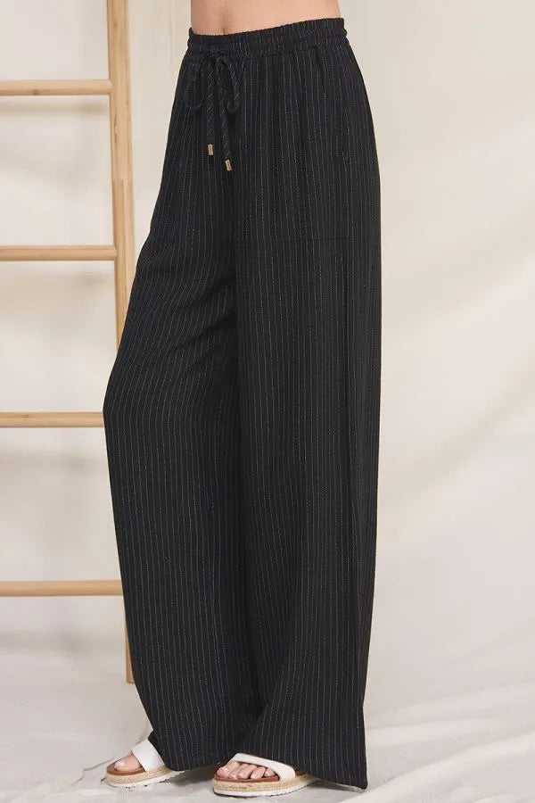 Black striped linen smock wide-leg pants with elastic smock waist and drawstring for comfortable wear