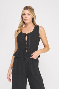 Black sleeveless linen blend top with ties lace trim and front tie detail in women’s boho chic clothing style