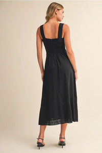 Black embroidered lace sleeveless empire midi dress featuring a square neckline and subtle embroidered hem