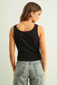 Black cowl neck sleeveless top with rounded neckline and fitted silhouette