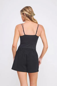 Black fine lace pattern scallop bralette with spaghetti straps and elastic waistband in relaxed fit design