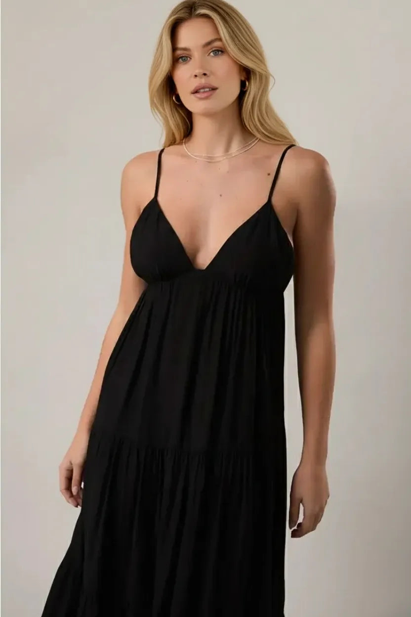 Black spaghetti strap tiered maxi dress with deep v-neckline