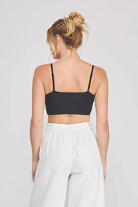 Black strapless crop top with adjustable spaghetti strap padded design and smooth stretchy fabric finish