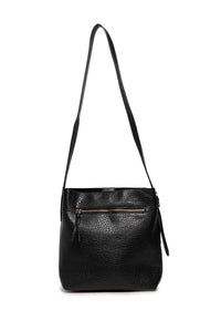 Black textured leather andie 2 in 1 bucket crossbody bag with gold-toned zipper and matching strap highlighting bag features