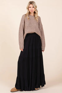 Black tiered flowy elastic waist maxi skirt with soft pleated texture and lined fabric for comfortable wear