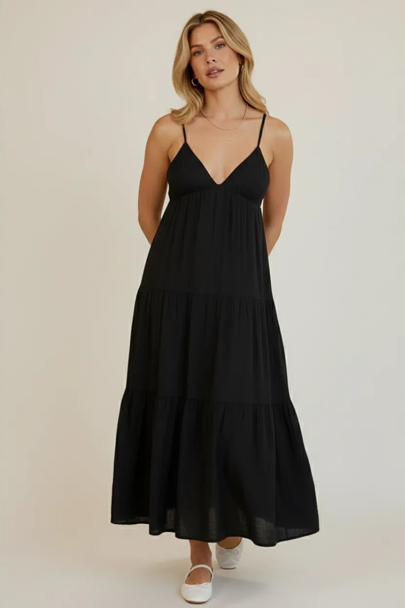Black spaghetti strap tiered maxi dress with v-neckline