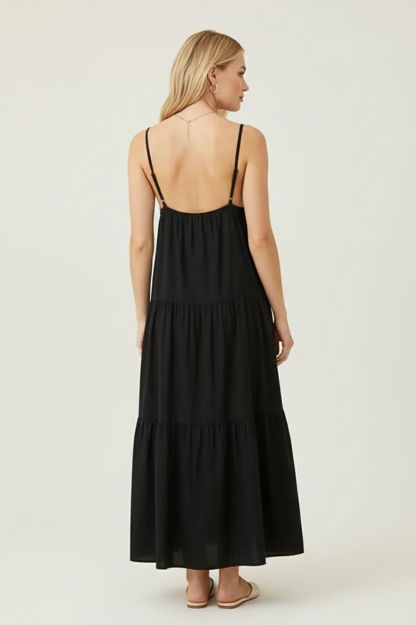 Black spaghetti strap tiered maxi dress with backless design