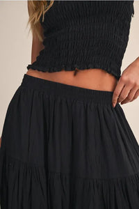 Black crinkled elastic maxi skirt with tiered ruffles and waistband