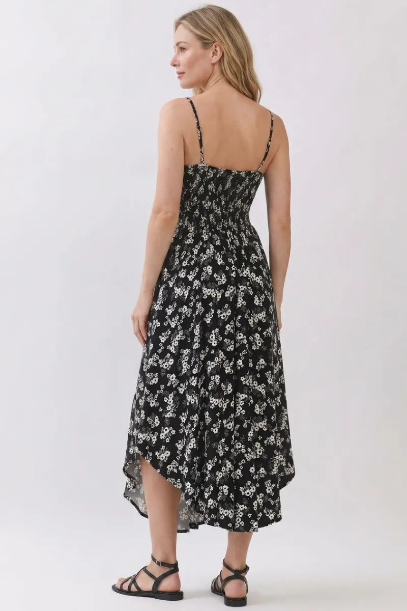 Black and white floral print midi dress with chest ruched detail thin spaghetti straps and high low hemline
