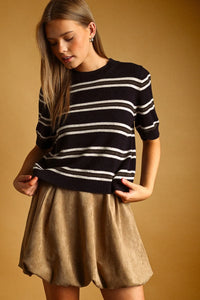 Black and white stripe pattern short sleeve knit top featuring a lightweight short sleeve knit design