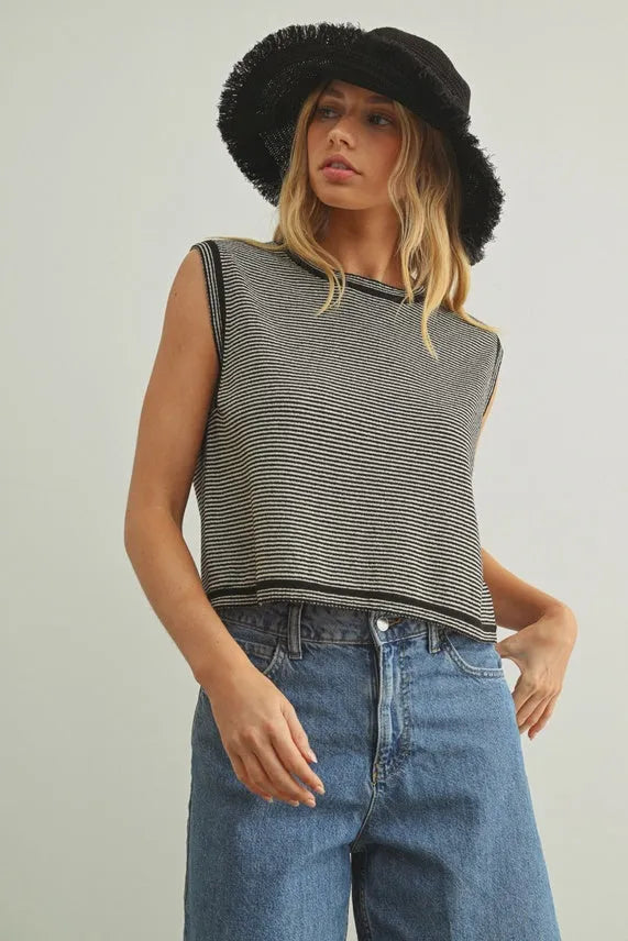 Black and white pinstriped sleeveless knit top with ribbed texture perfect for stylish summer wear