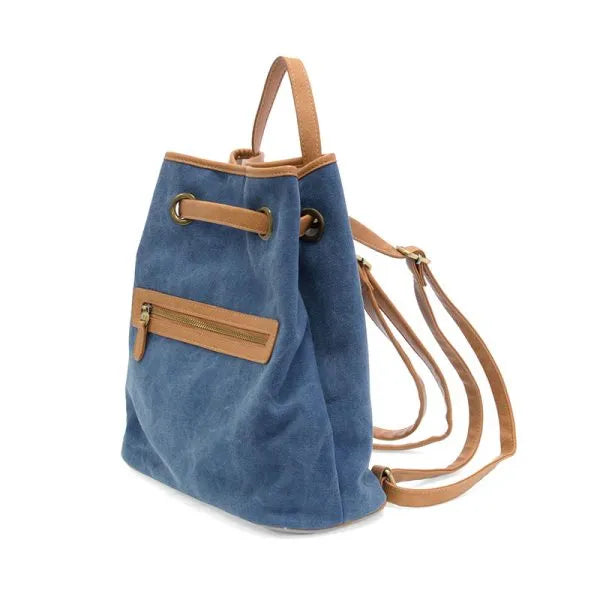 Memphis canvas backpack in blue canvas with tan leather straps and zipper accents for durable everyday use