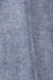 Blue denim textured fabric of tencel smocked tiered midi dress with a slightly worn appearance