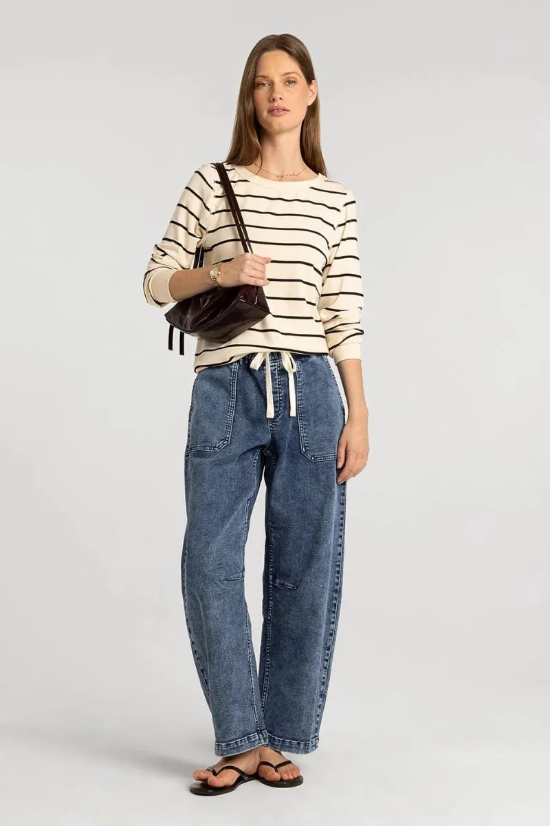 Blue denim jeans with drawstring waist and patch pockets paired with long sleeve basic stacy top from basics collection