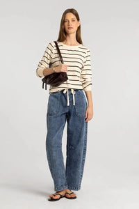 Blue denim jeans with drawstring waist and patch pockets paired with long sleeve basic stacy top from basics collection