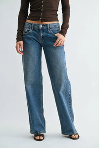 Low rise relaxed straight denim jeans in blue with classic five-pocket design and straight-leg cut made of denim