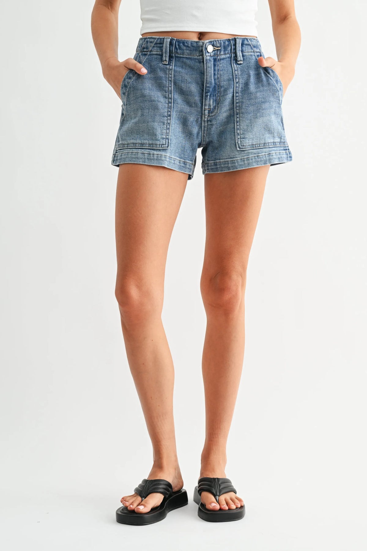 High rise trouser denim short with blue high-waisted design and front pockets