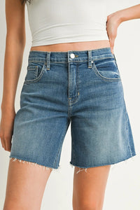 Blue denim mid rise bermuda jean shorts with frayed hem and classic five-pocket rise bermuda denim design