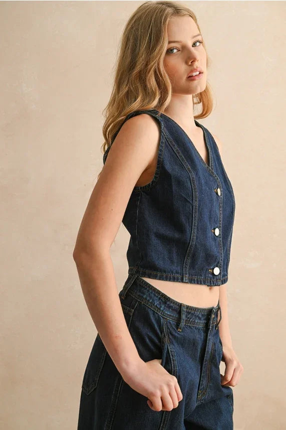 Blue denim vest with button front and stitched seams for women’s boho chic clothing