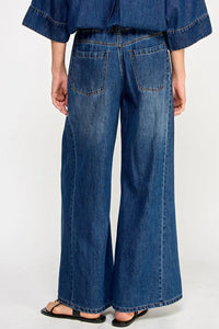 Blue drawstring wide leg denim pants with relaxed fit and back pockets
