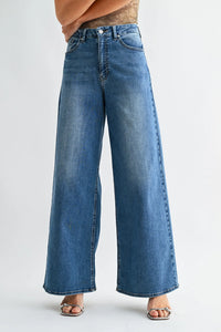 Blue denim high rise full length loose straight denim jeans with classic five-pocket design in cotton material