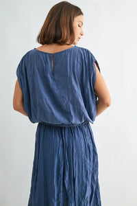 Crinkle satin elastic hem top with flowing blue crinkled fabric and loose sleeves
