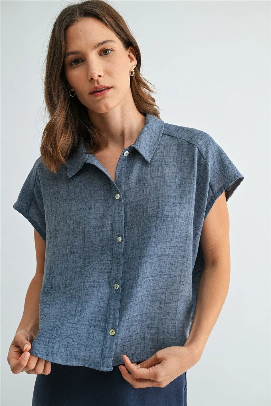 Blue linen dolman sleeve button down shirt with collar and subtle texture for casual and formal wear