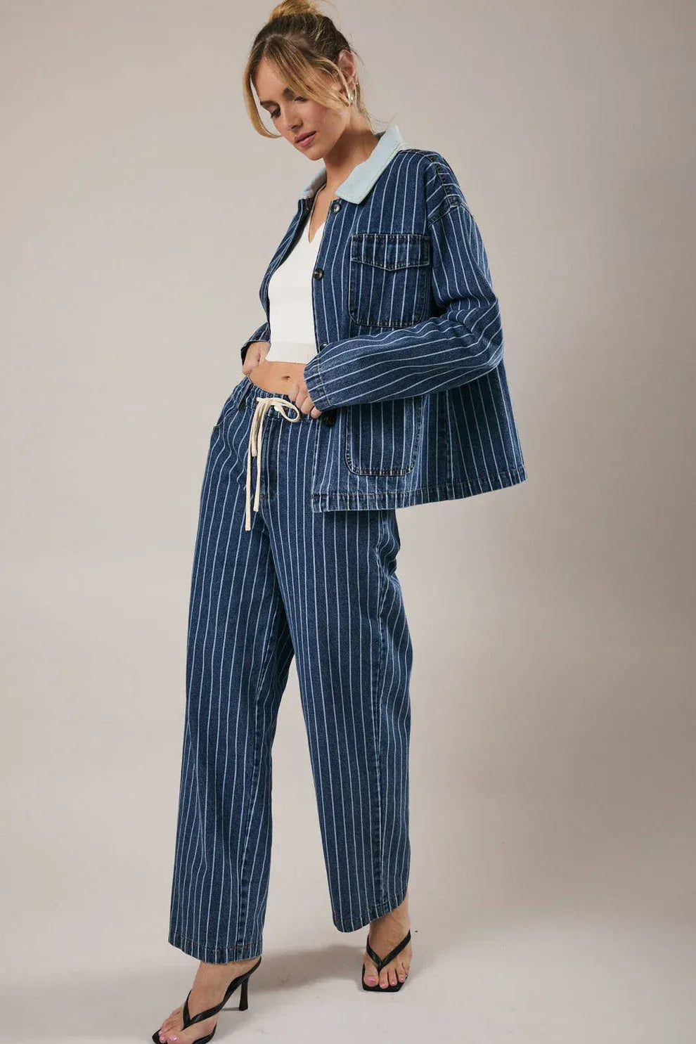 Stripe oversized collar denim jacket with blue pinstripe pants