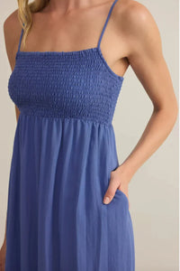 Beachside smocked midi dress in blue with spaghetti straps and side pocket
