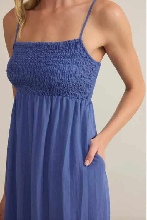 Beachside smocked midi dress in blue with spaghetti straps and side pocket