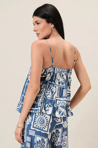 Blue and white abstract print spaghetti strap top with ruffled hem featuring sleeveless design for casual wear