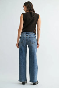 Blue low rise mid wash wide leg denim jeans with classic five-pocket design and slightly faded wash